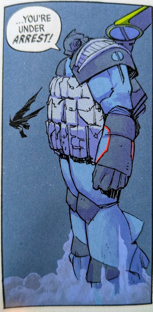 Absolute Batman smashing into the chest of a giant Absolute Robin mech that is telling him that he is under arrest.