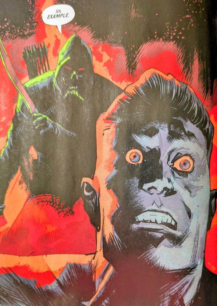 Absolute Green Arrow ominously behind a bag guy in a horror movie like scene