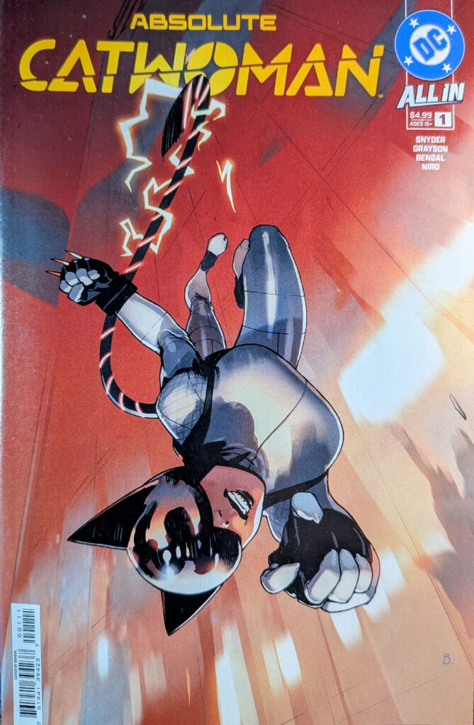 Absolute Catwoman #1 comic book cover A depicting Absolute Catwoman with an electrified tail falling downwards with her fist out and teeth gritted. 