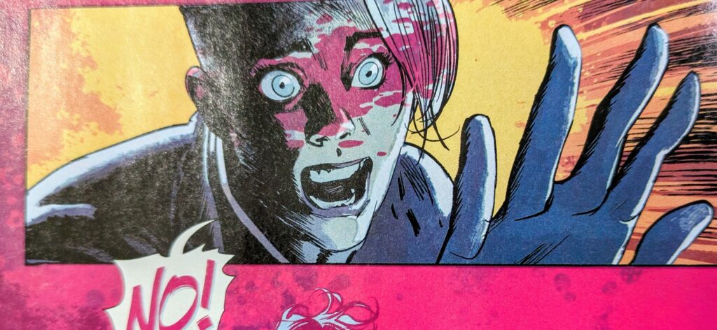 Absolute Black Canary with blood splattered across her face and eyes, almost like war paint, as she reaches out and yells, "No!".