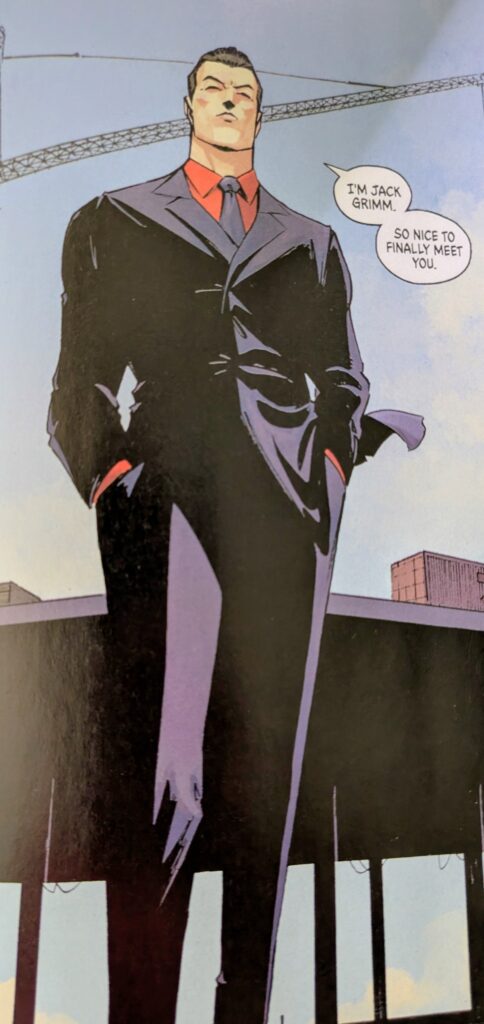 Jack Grim introducing himself to Bruce on a job site while wearing a suit.
