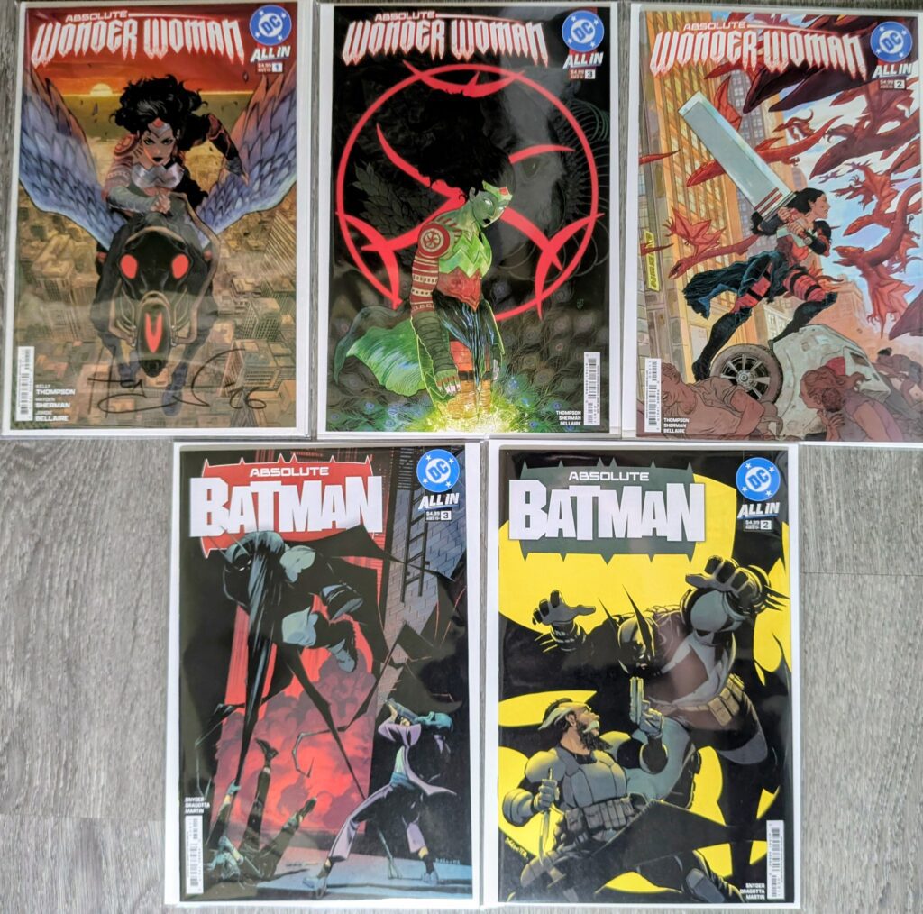Absolute Wonder Woman and Absolute Batman books I purchased at Heroes Con. I got the Absolute Wonder Woman #1 cover A signed by Hayden Sherman