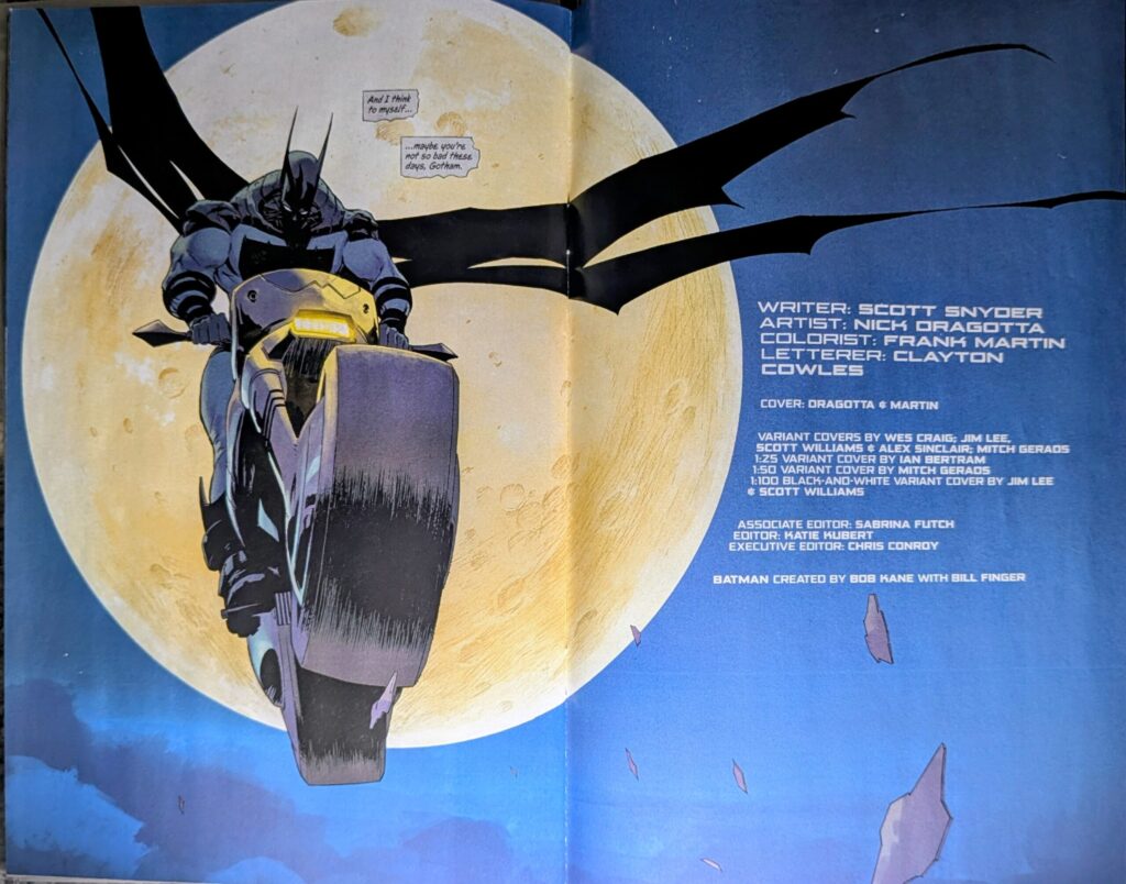 Absolute Batman drops in front of the moon on a motocycle for the credits page with deeb blue behind the moon.