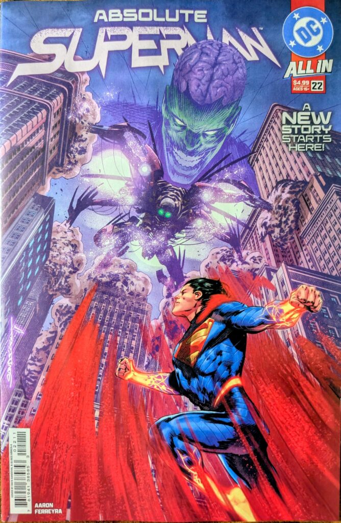 Absolute Superman #22 comic book cover A featuring Absolute Superman looking up as a large Absolute Matallow crashes down through the tall building with Absolute Brainiac looming in the sky in the background.