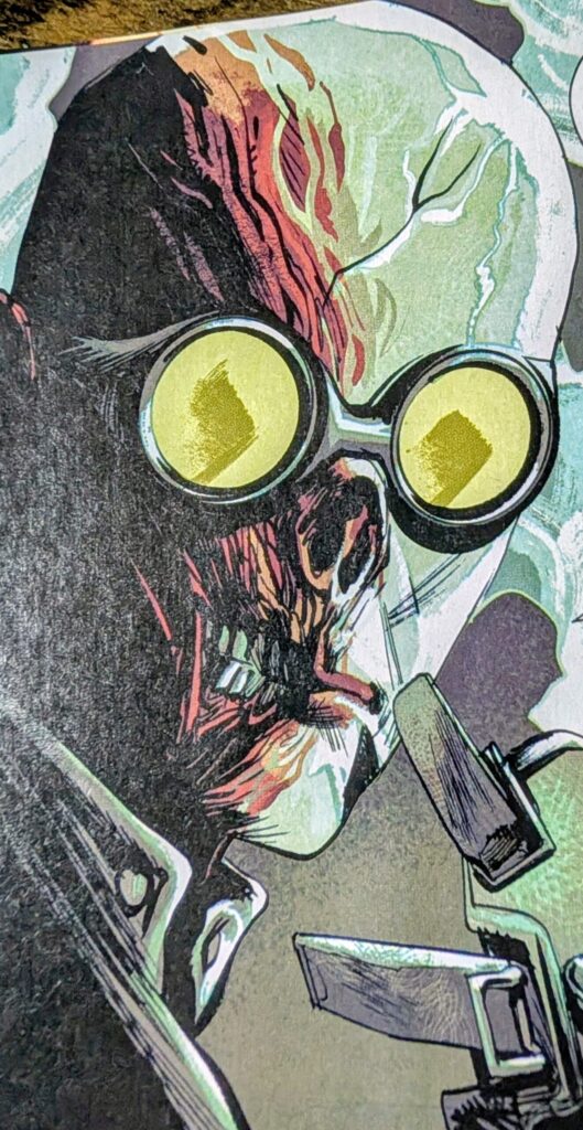 Edvin Zytle who has been running experiments turn people into monsters, visually looking like a monster himself as he appears to be missing part of his face.