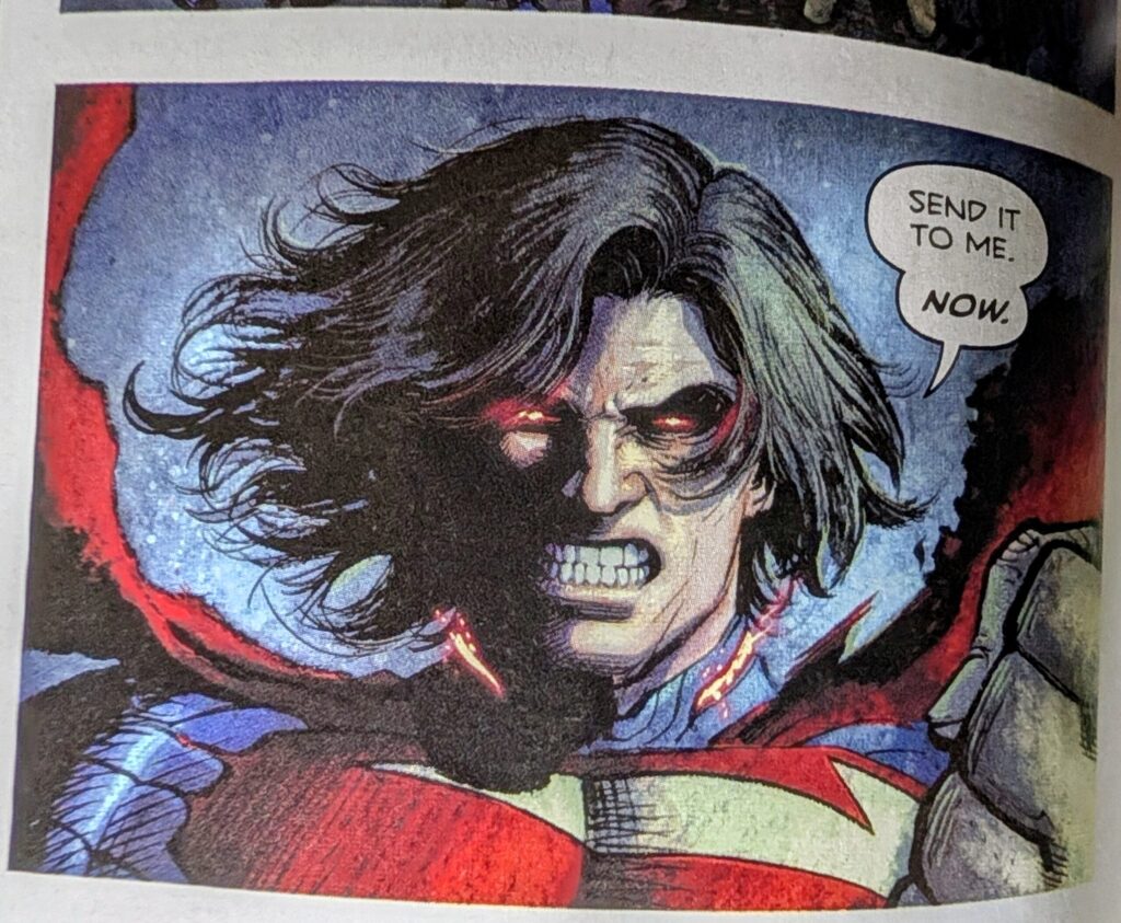 Absolute Superman angry with glowing red eyes demanding the list of absolute Toyman's clients be sent to him now.